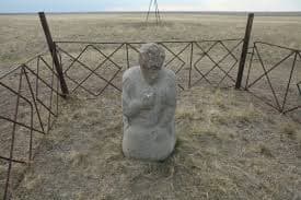 Шонх таван толгойн хүн чулуун хөшөө